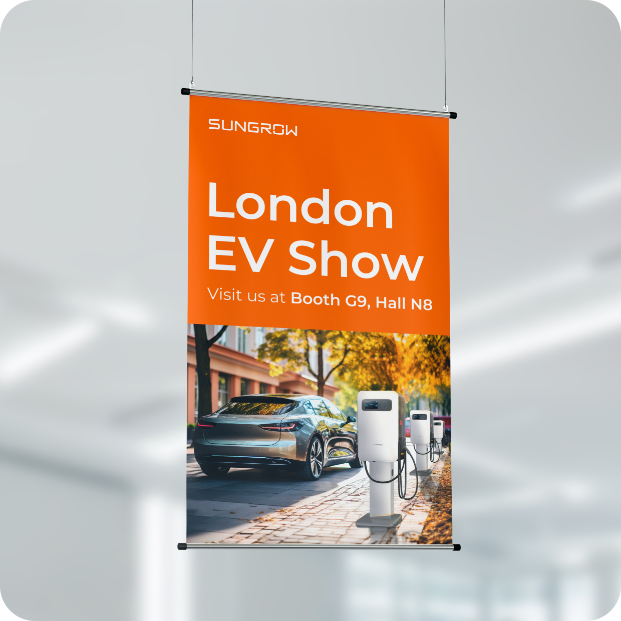 Hanging banner design for Sungrow at the London EV Show, featuring an electric car and charging station.